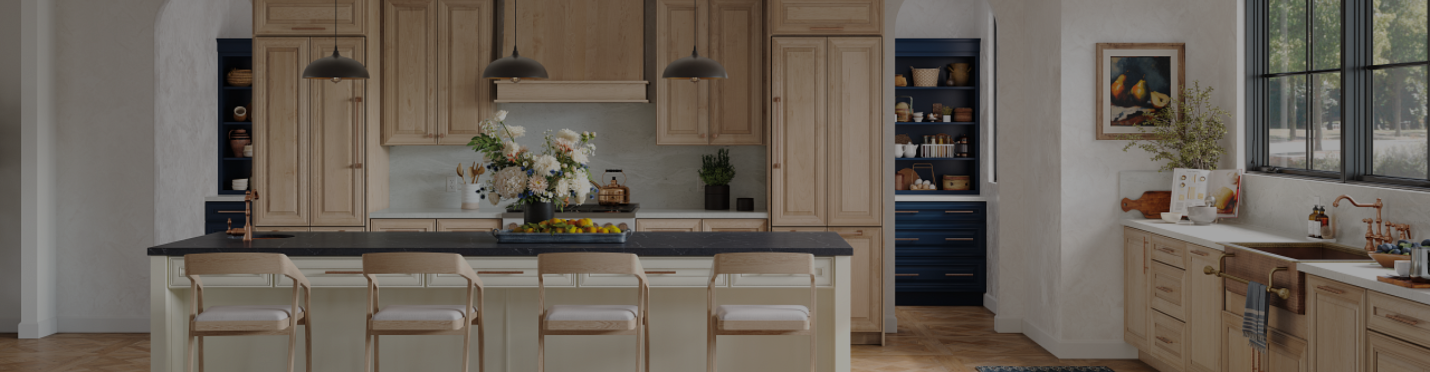 Dream Kitchen with natural wood cabinets and black countertops