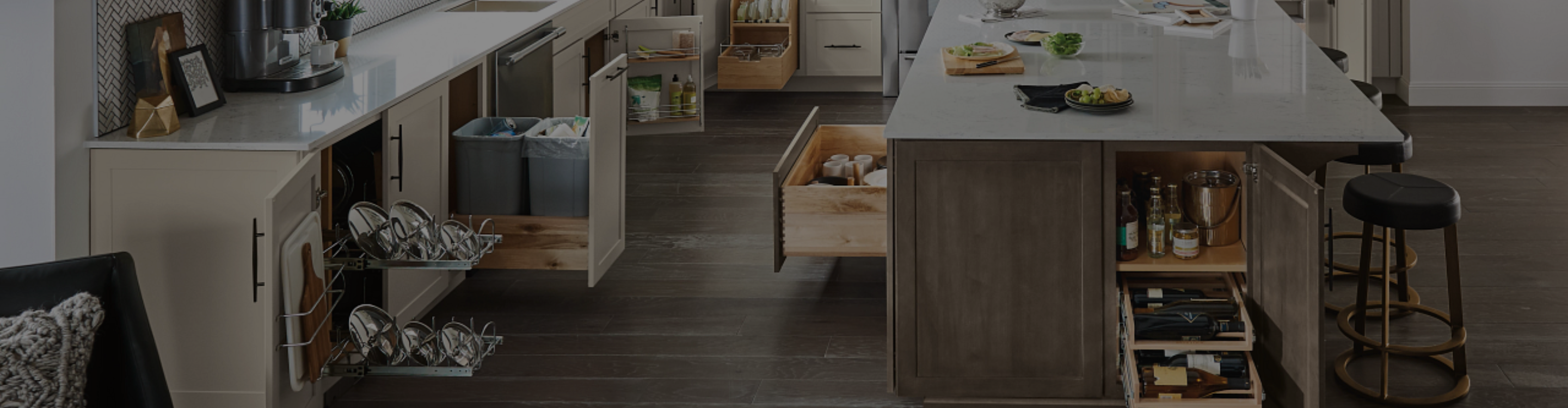 Designer kitchen with custom glass front cabinetry and kitchen island with built-in storage