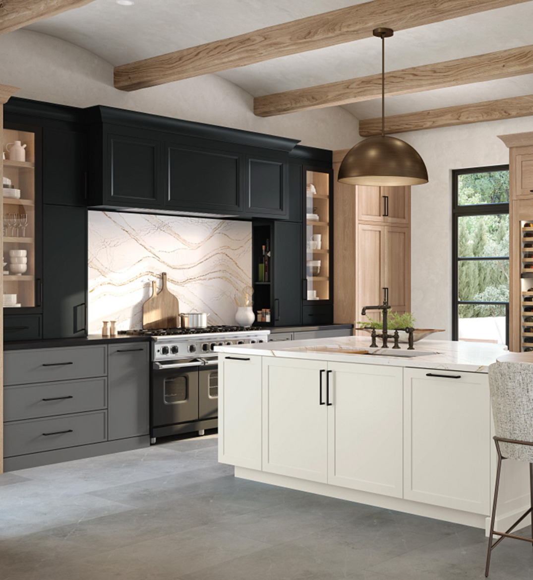 Gray tile flooring in a kitchen with white kitchen island